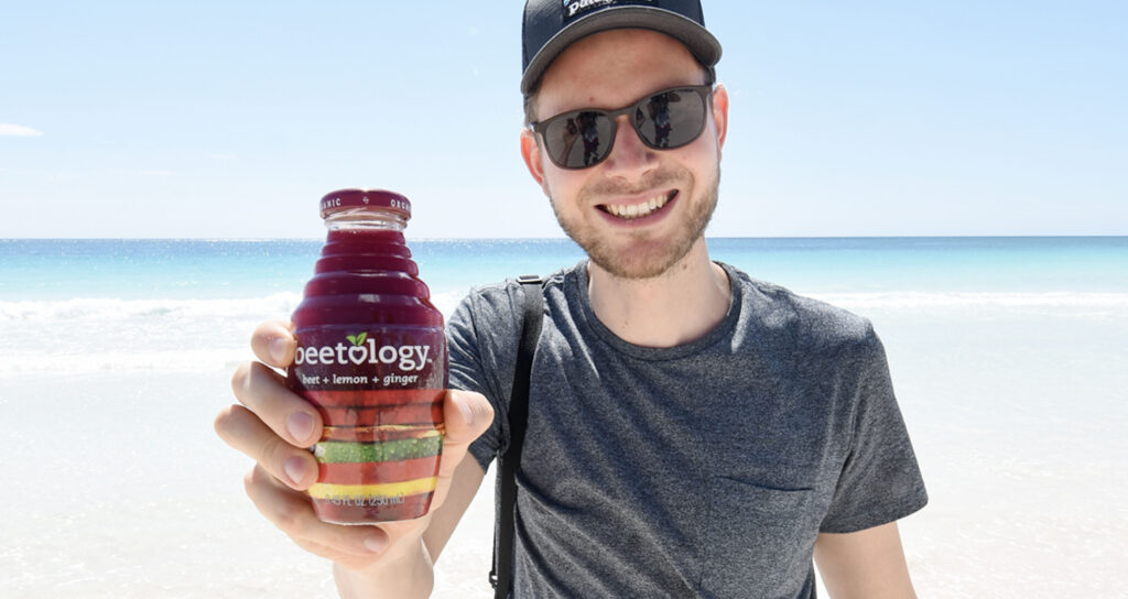 Beetology Beet + Lemon + Ginger 100% organic cold-pressed juice beach image