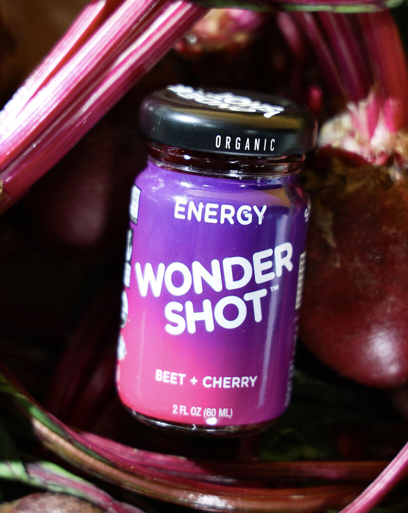 Wonder Shot Energy on beet background image